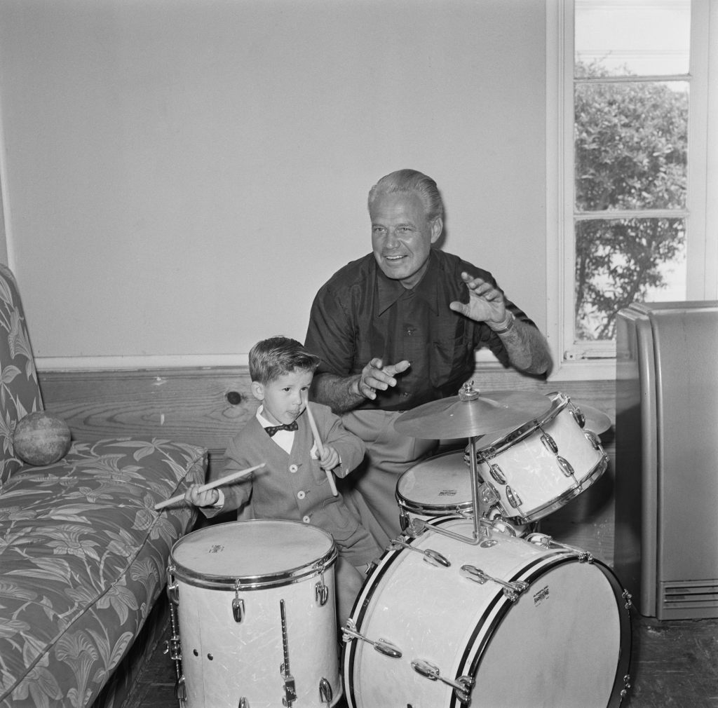 American child actor and musician Keith Thibodeaux (later Richard Keith), drummer with the Horace Heidt Orchestra, pictured with Horace Heidt, 11th July 1955.