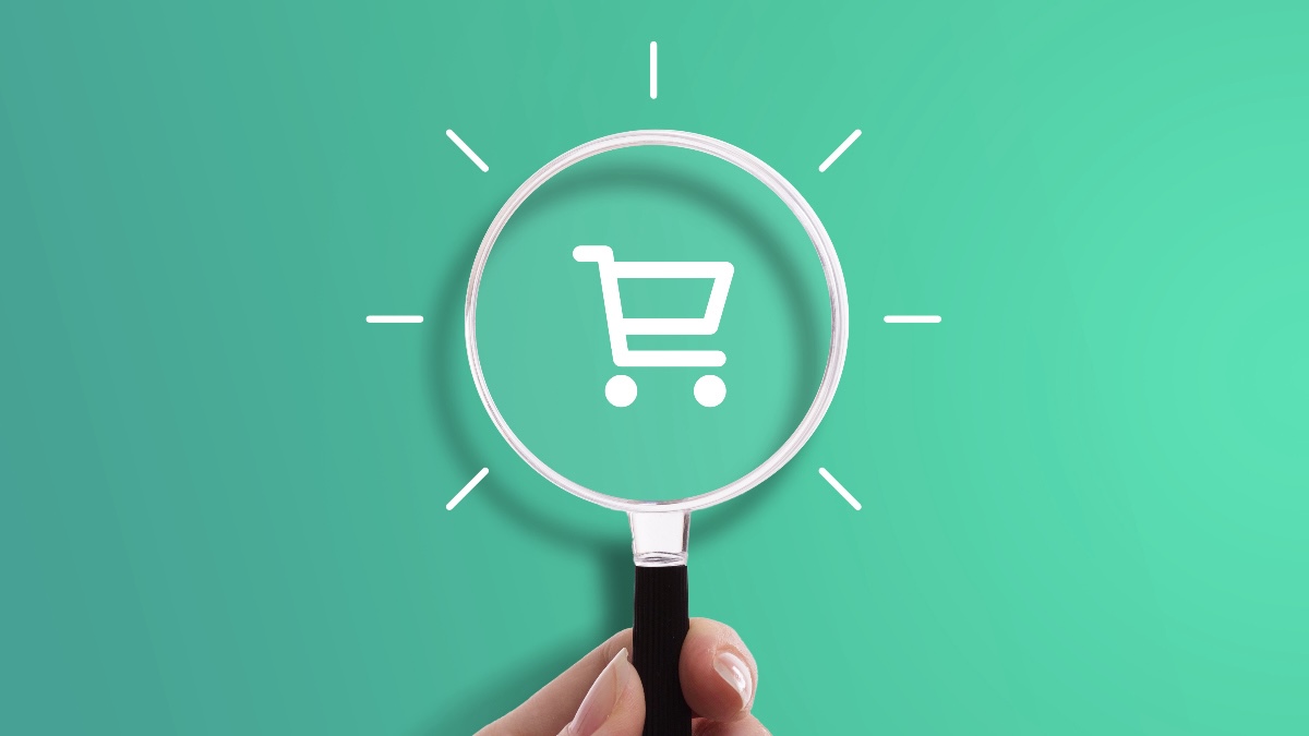 magnifying glass hovers of an illustration of a shopping cart