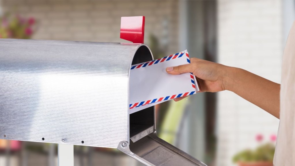 women getting her mail