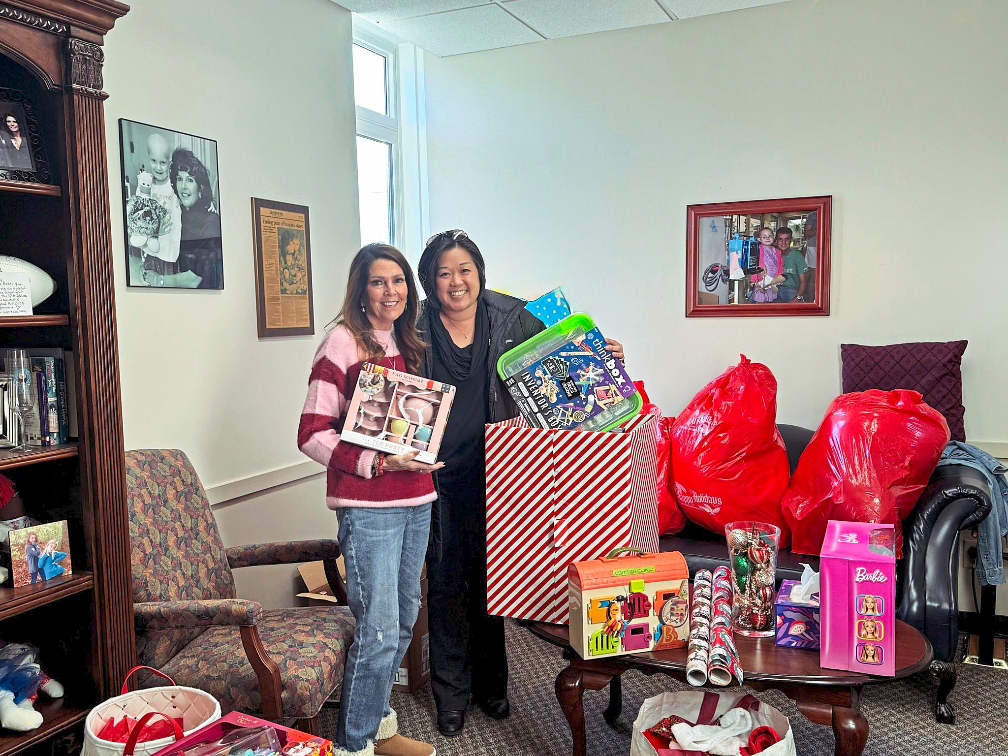 Marty Postlethwait (left), founder of the Shadow Buddies Foundation, gathers hundreds of Christmas gifts each year for sick kids and their families