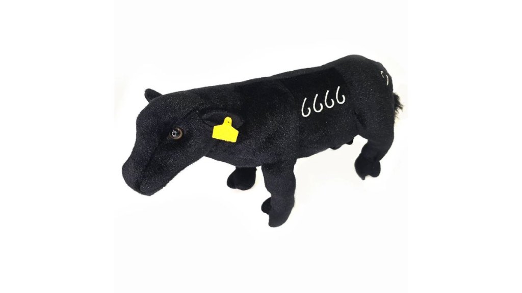 A 6666 branded cow stuffed animal