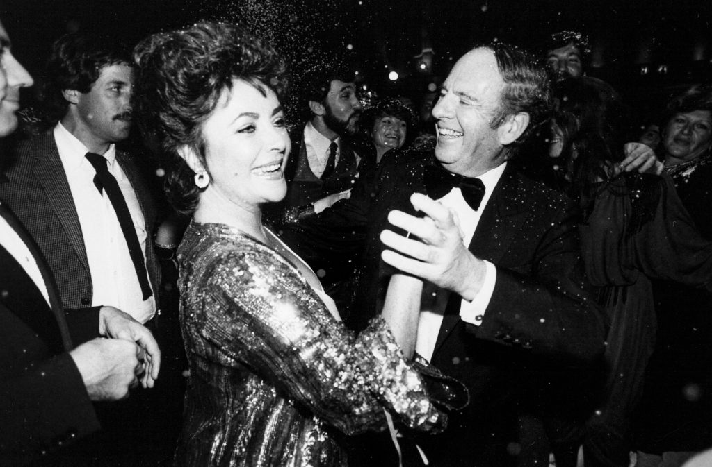 Elizabeth Taylor dances with Victor Luna on New Year's Eve (1982)