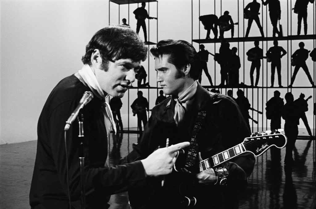 ELVIS: '68 COMEBACK SPECIAL -- Pictured: (l-r) Director Steve Binder, Elvis Presley during his '68 Comeback Special on NBC