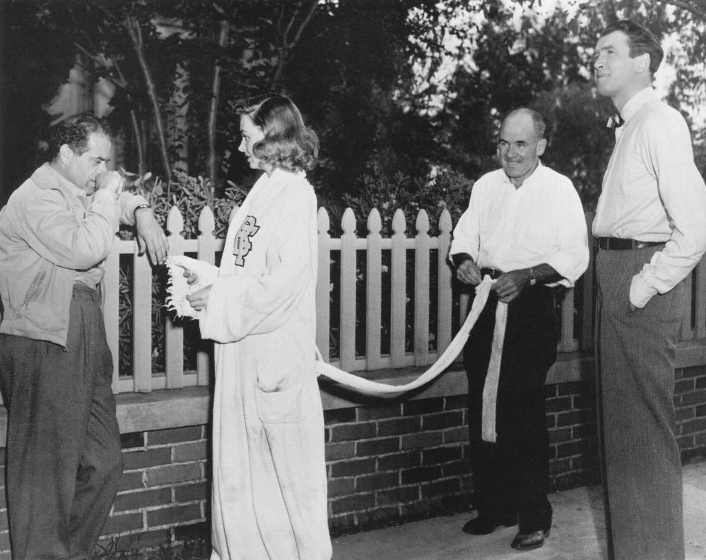 Frank Capra, Donna Reed and James Stewart on the set of It's a Wonderful Life