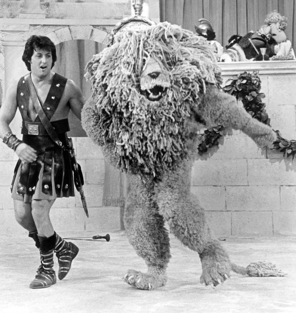 THE MUPPET SHOW, background from left: Rowlf the Dog, Zelda, foreground left: Sylvester Stallone with Sundance the Lion (Season 3, Episode 20, aired January 9, 1979)