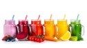 Colorful drinks and smoothies made with heart-healthy ingredients next to fresh fruit