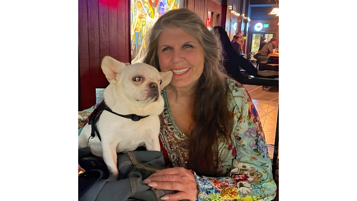 Anahata Graceland with a Royal Frenchel companion dog