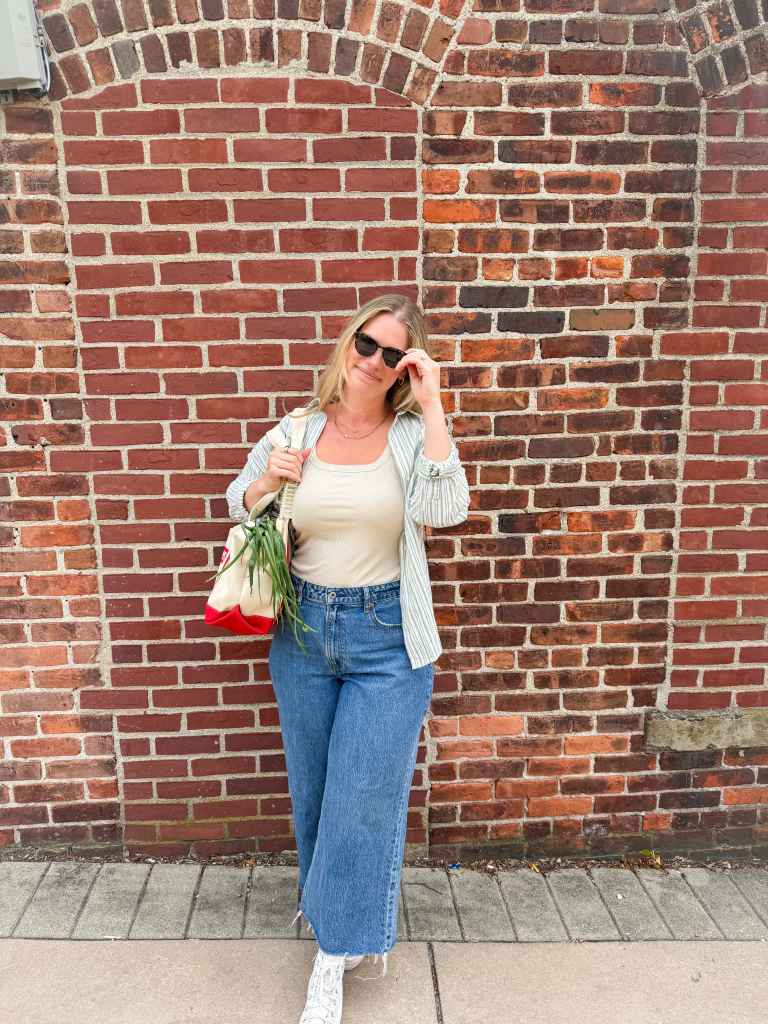 Jenn Lueke by brick wall