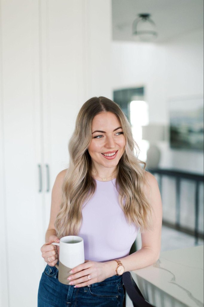 Katie Stewart drinking out a mug