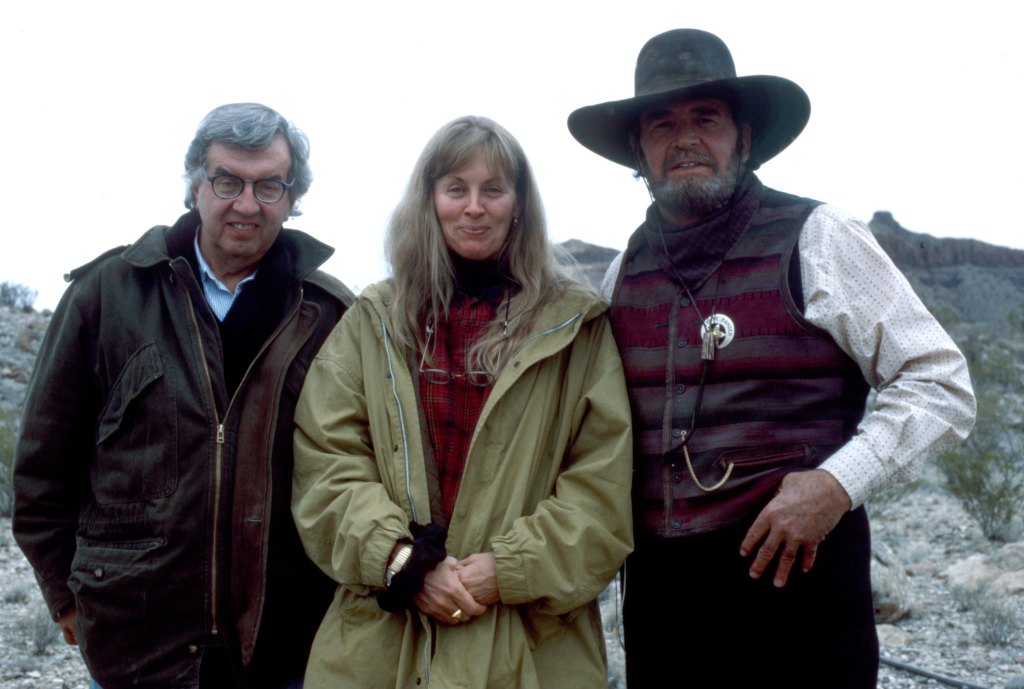 Larry McMurtry and his writing partner, Diana Ossana, on the set of their miniseries The Streets of Laredo (1995) with James Garner