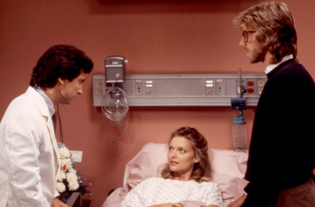 Michelle Pfeiffer with Griffin Dunne (left) and Peter Horton (right) in Amazon Women on the Moon (1987)