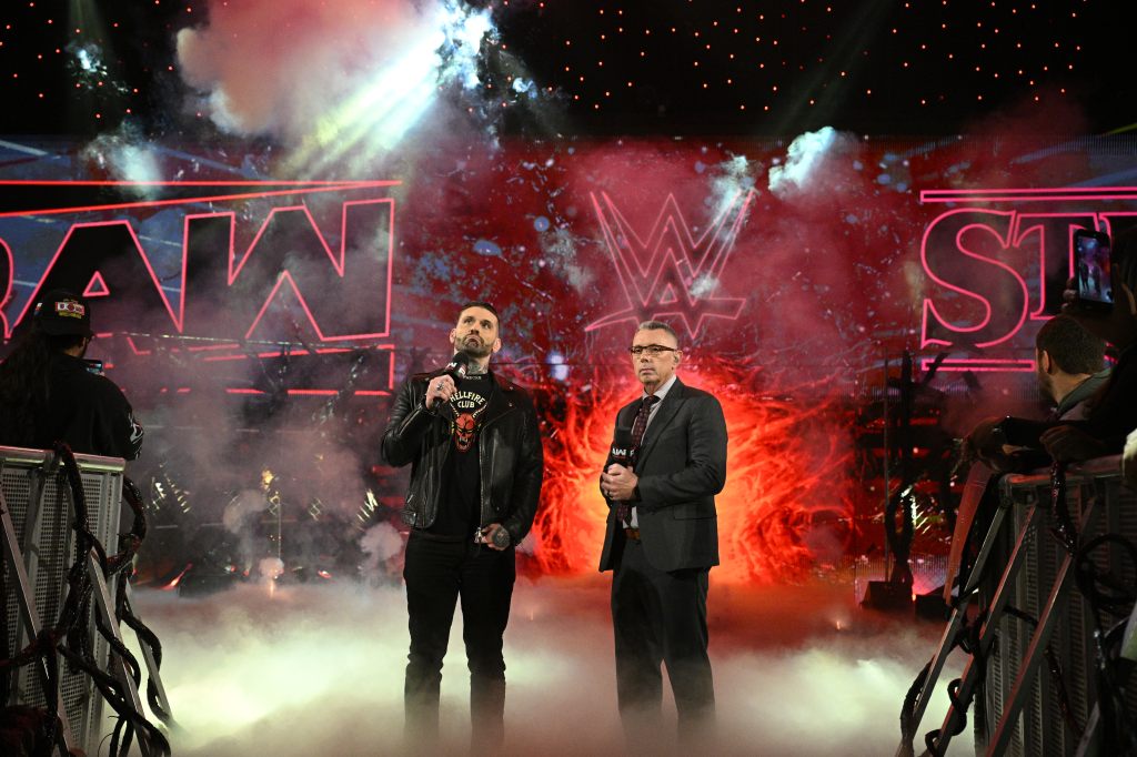 Corey Graves and Michael Cole during a Stranger Things–themed episode of WWE Monday Night RAW