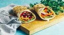A restaurant meal featuring two small sandwich wraps for customers taking GLP-1 medications.