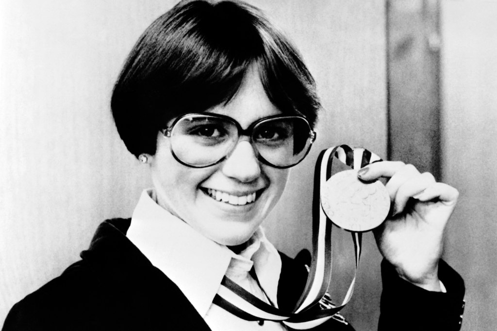 Dorothy Hamill shows off her gold medal in 1976