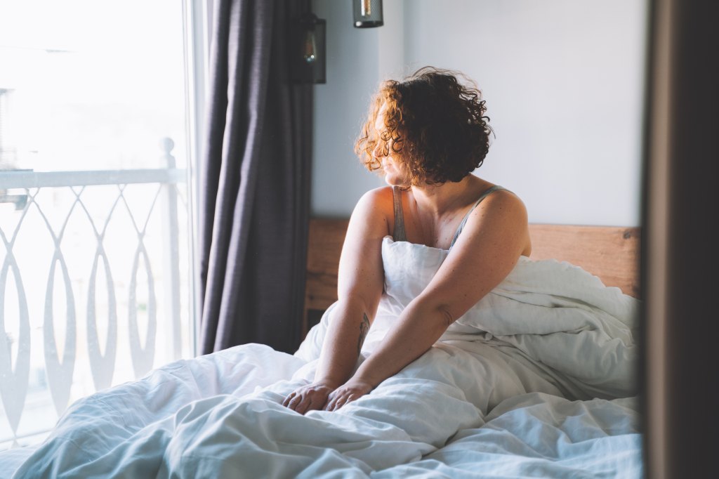 Woman waking up in the morning