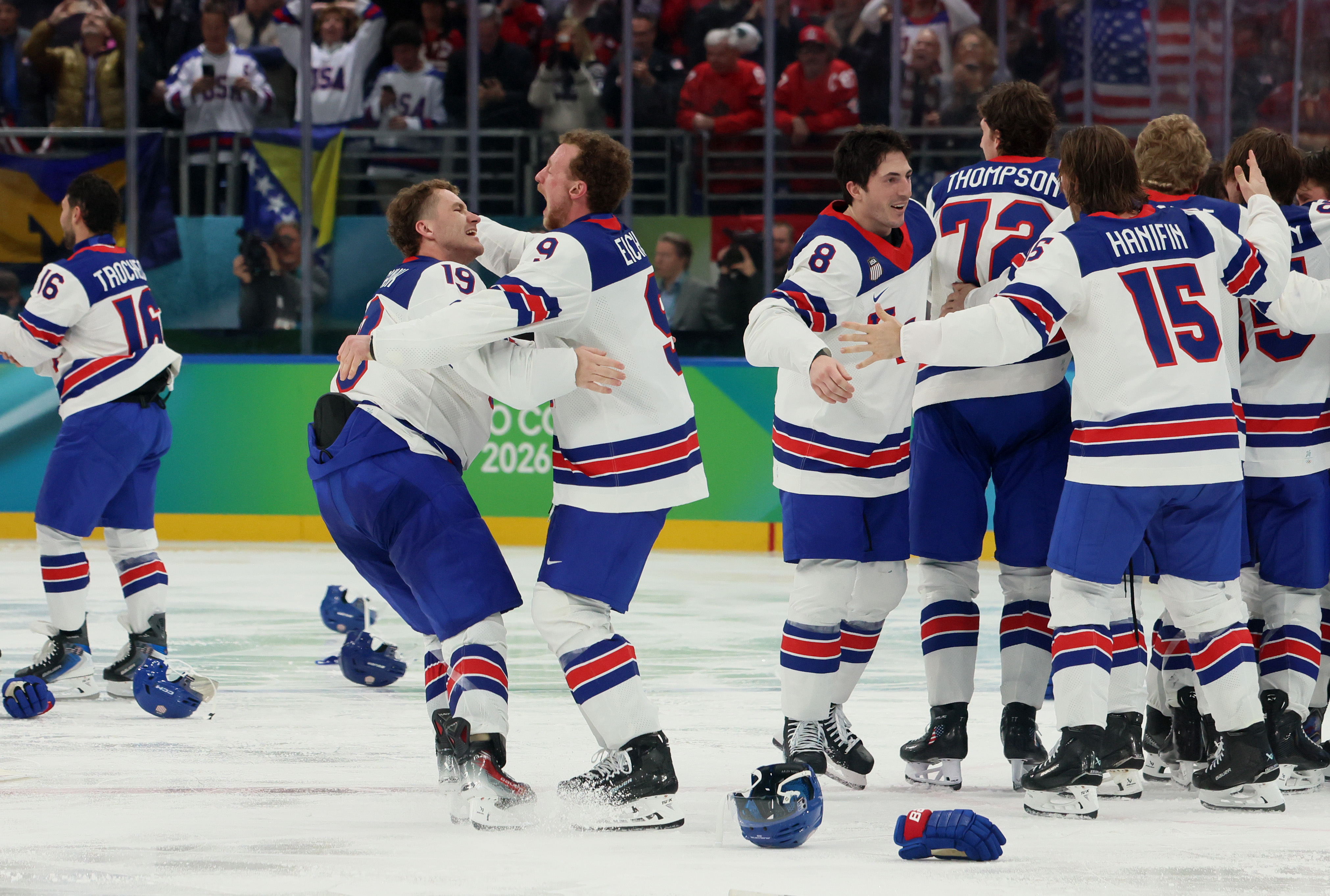 MILAN, ITALY - FEBRUARY 22: Matthew Tkachuk #19, Jack Eichel #9 of Team United States and teammates celebrate their gold medal win during the Men's Gold Medal match between Canada and the United States on day 16 of the Milano Cortina 2026 Winter Olympic games at Milano Santagiulia Ice Hockey Arena on February 22, 2026 in Milan, Italy. (Photo by Bruce Bennett/Getty Images)