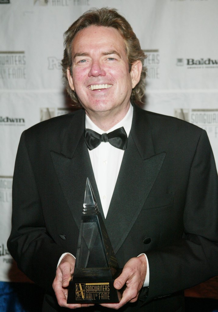 Jimmy Webb poses with an award from the Songwriters Hall of Fame in 2003