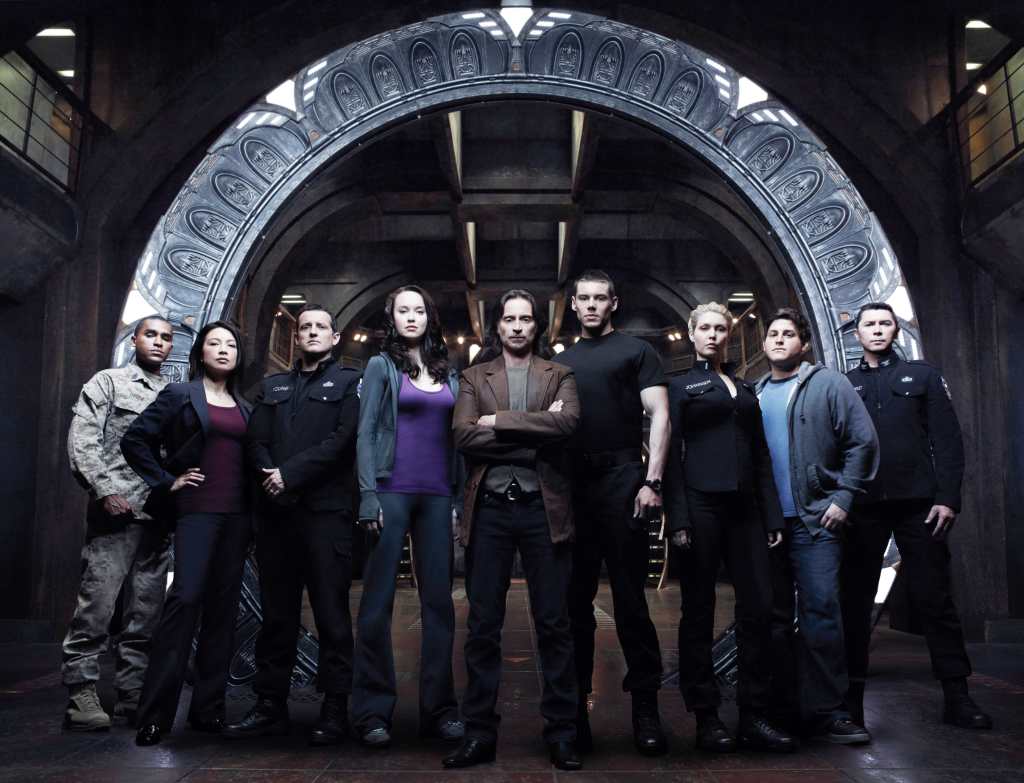 STARGATE UNIVERSE, (from left): Jamil Walker Smith, Ming-Na, Louis Ferreira, Alaina Huffman, Robert Carlyle, Brian J. Smith, Elyse Levesque, David Blue, Lou Diamond Phillips, (Season 1), 2009-2011. 