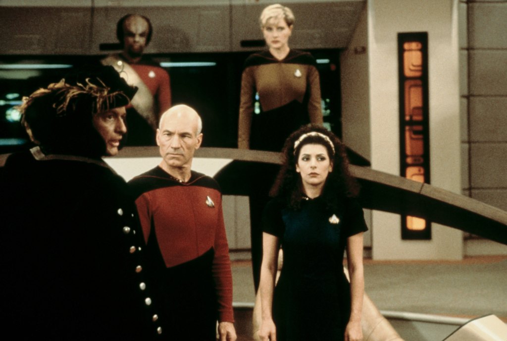 STAR TREK: THE NEXT GENERATION, Patrick Stewart (front, 2nd from left), Marina Sirtis (front, right), (back): Michael Dorn, Denise Crosby, 'Encounter at Farpoint', (Season 1, ep. 101, aired Sept. 26, 1987), 1987-94.