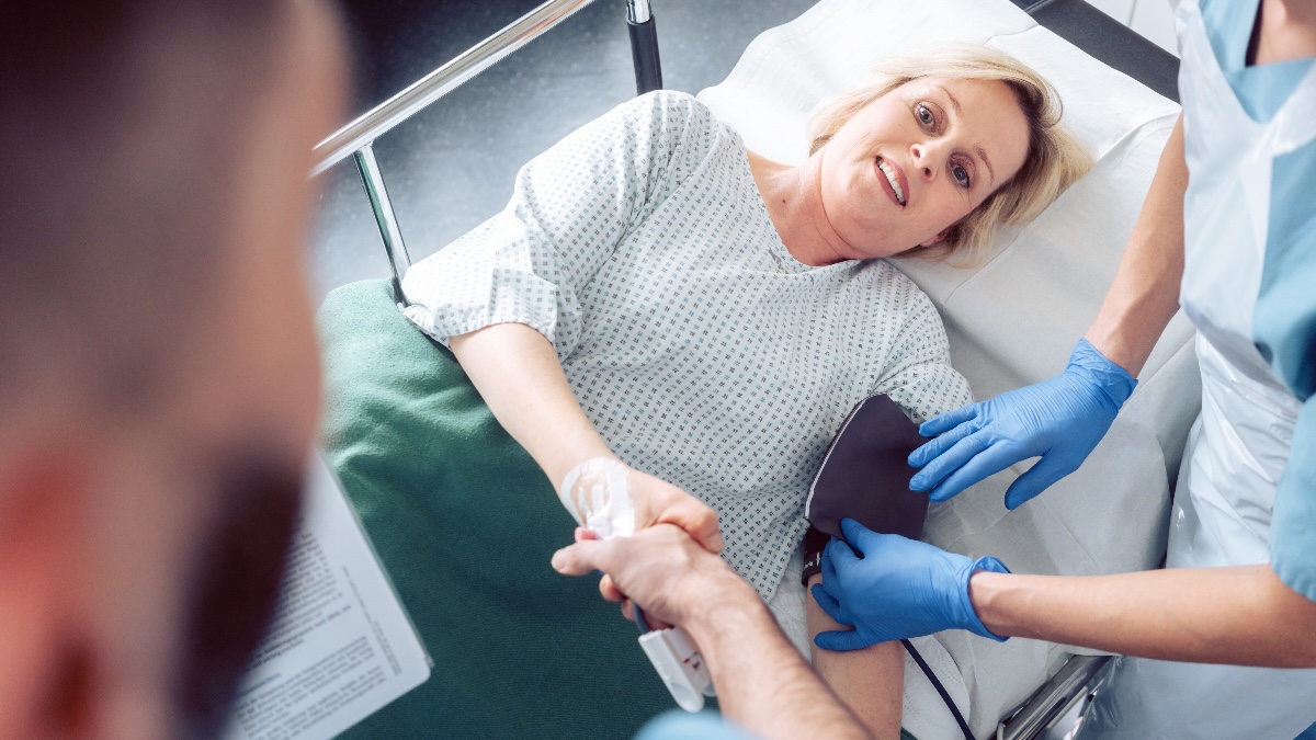 Doctor greeting patient before starting her colonoscopy