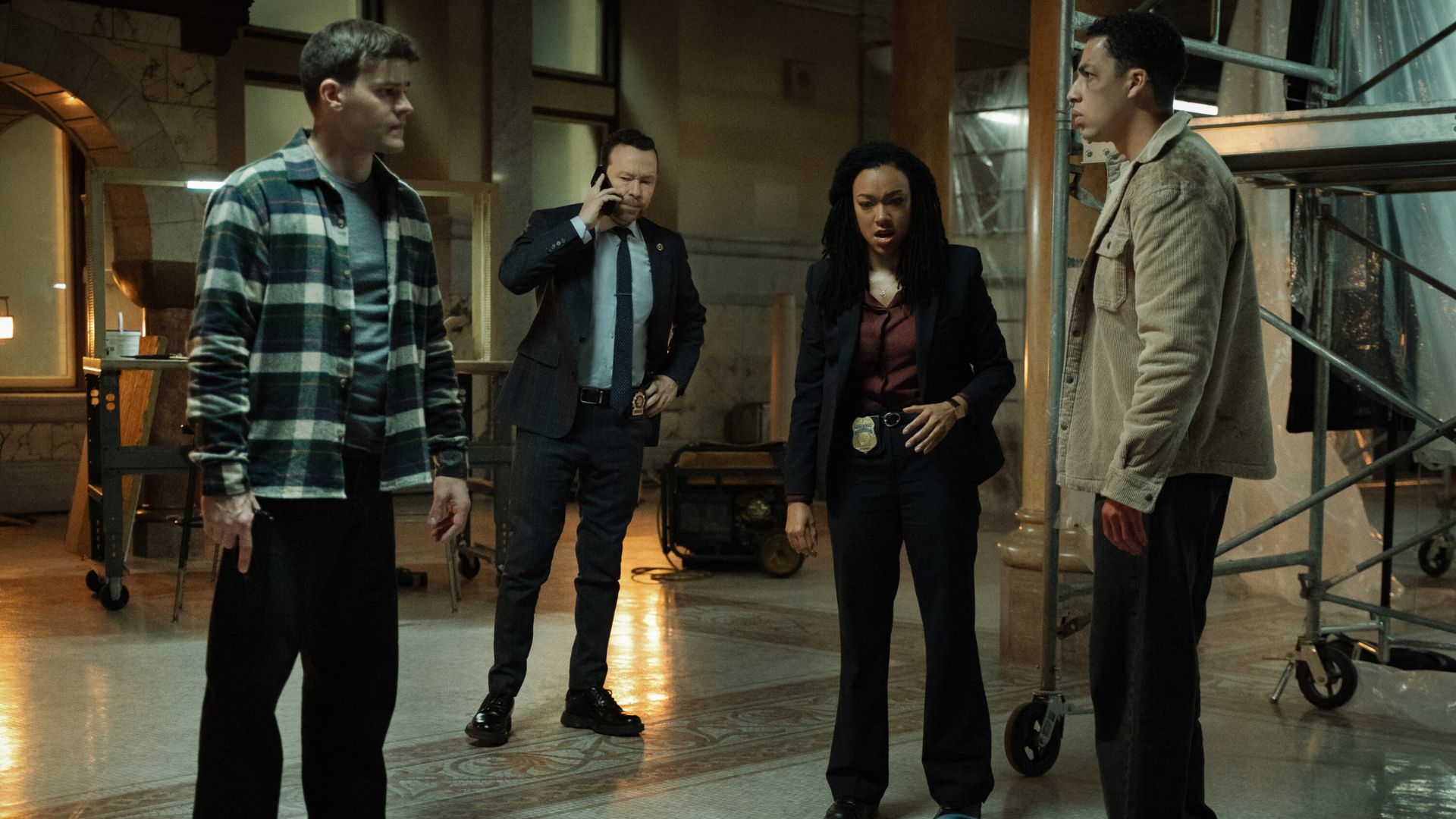 Mika Amonsen as Sean Reagan, Donnie Wahlberg as Danny Reagan, Sonequa Martin-Green as Lena Silver, and Marcus Scribner as Jonah Silver in 'Boston Blue'