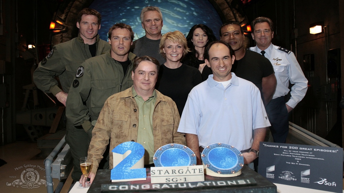 The cast of 'Stargate SG-1' with executive producers Brad Wright and Robert C. Cooper celebrate the 200th episode