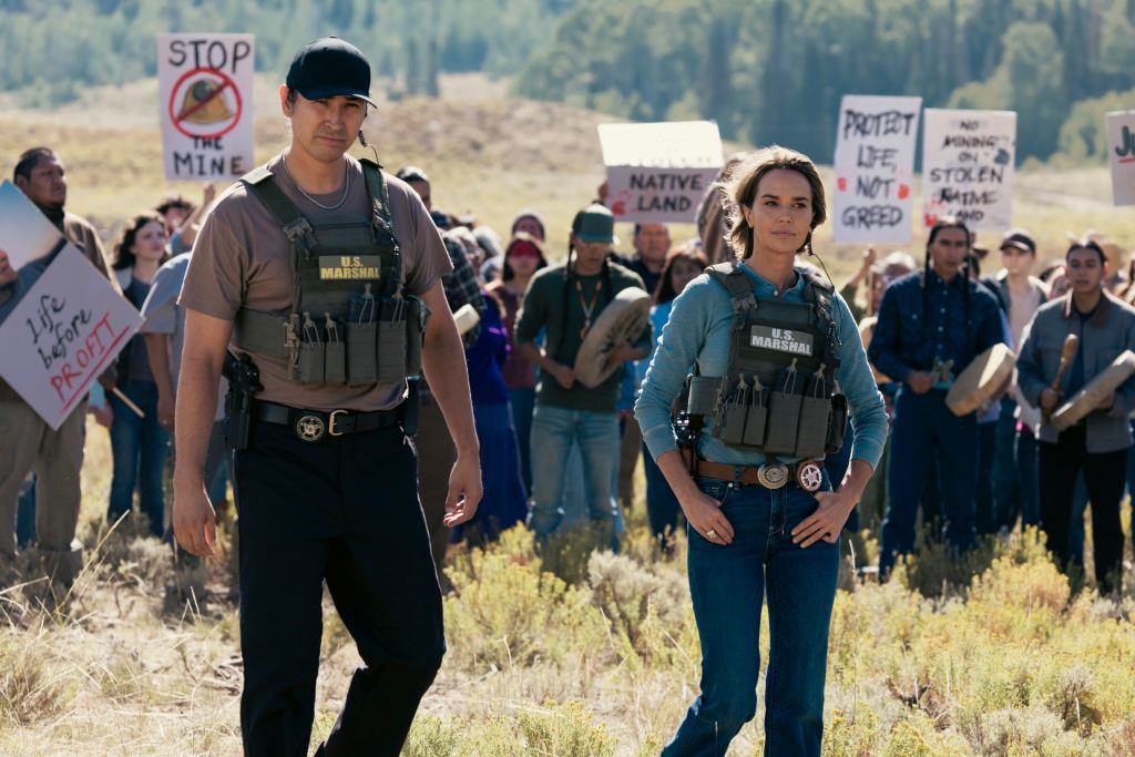 Tatanka Means as Miles and Arielle Kebbel as Belle, Marshals