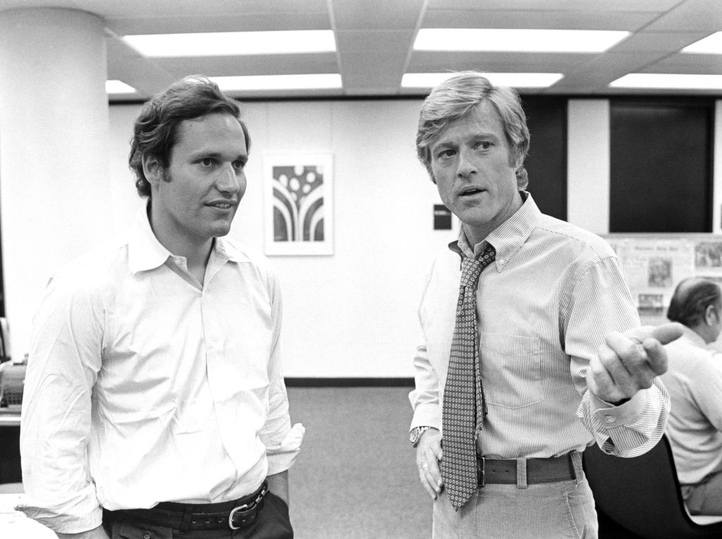 ALL THE PRESIDENT'S MEN, from left, Bob Woodward, with Robert Redford, who portrays him in the film, on-set, 1976
