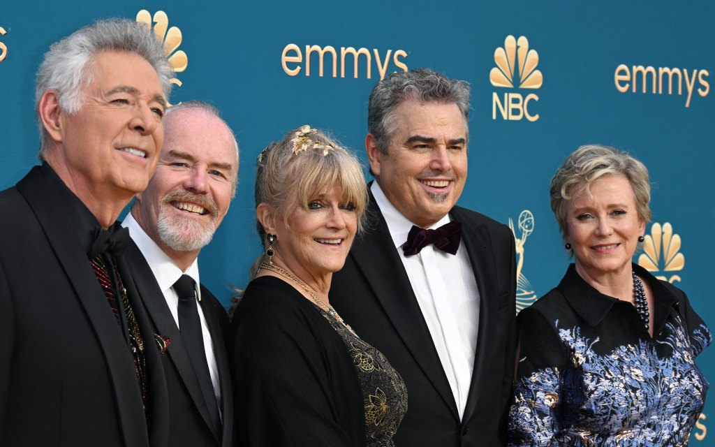 (L-R) US actors Barry Williams, Mike Lookinland, Susan Olsen, Christopher Knight and Eve Plumb arrive for the 74th Emmy Awards at the Microsoft Theater in Los Angeles, California, on September 12, 2022.