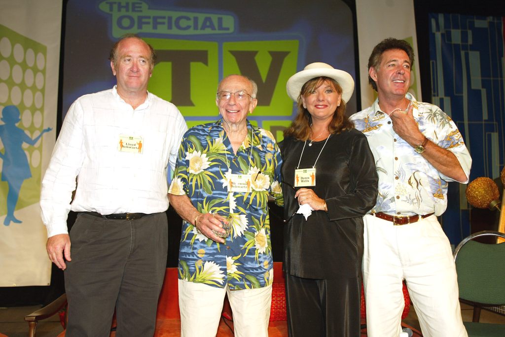 (L to R) Producer Lloyd Sherwood, producer Sherwood Schwartz, "Gilligans Island" actress Dawn Wells and "Brady Bunch" actor Barry Williams appear at the First Official TV Land Convention at the Burbank Airport Hilton on August 16, 2003 in Burbank, California.