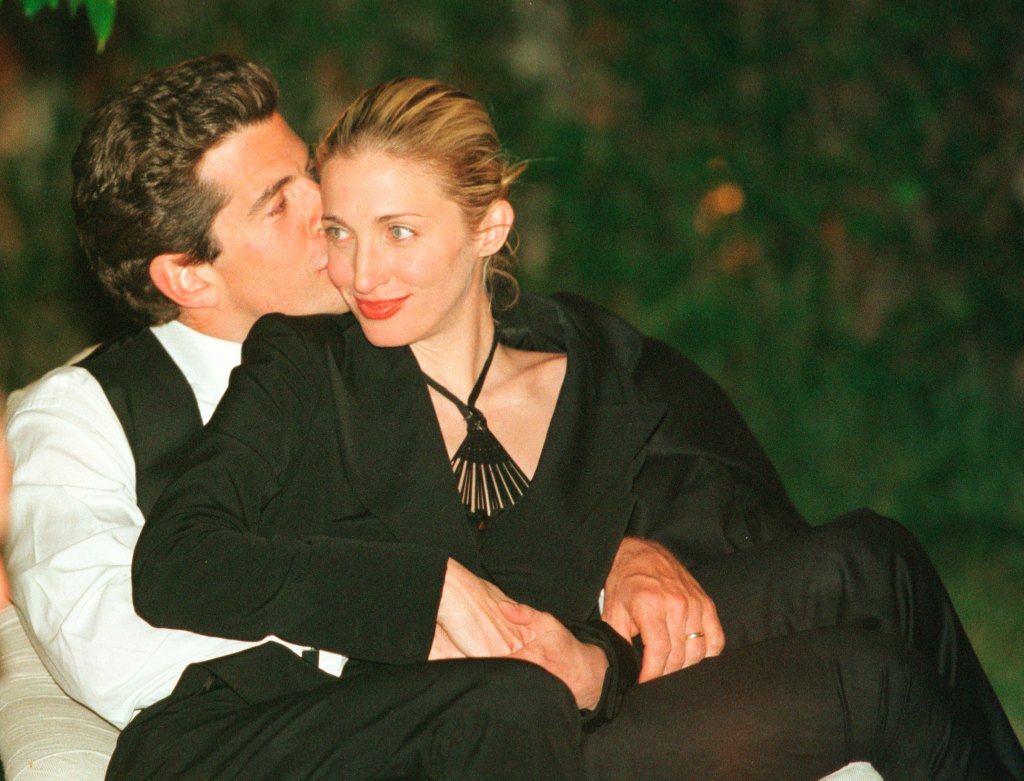 John F. Kennedy, Jr. editor of George magazine, gives his wife Carolyn a kiss on the cheek during the annual White House Correspondents dinner May 1, 1999 in Washington, D.C. July 16, 2000 marks the one year anniversary of the plane crash which killed Kennedy, his wife and sister-in-law. (Photo by Tyler Mallory/Liaison)