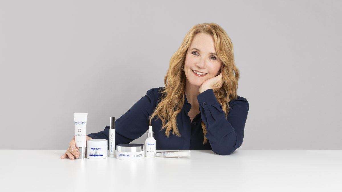 Lea Thompson with skincare products