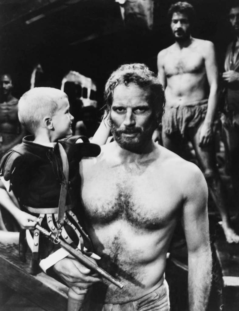 THE TEN COMMANDMENTS, from left: Fraser Heston, Charlton Heston on set, 1956