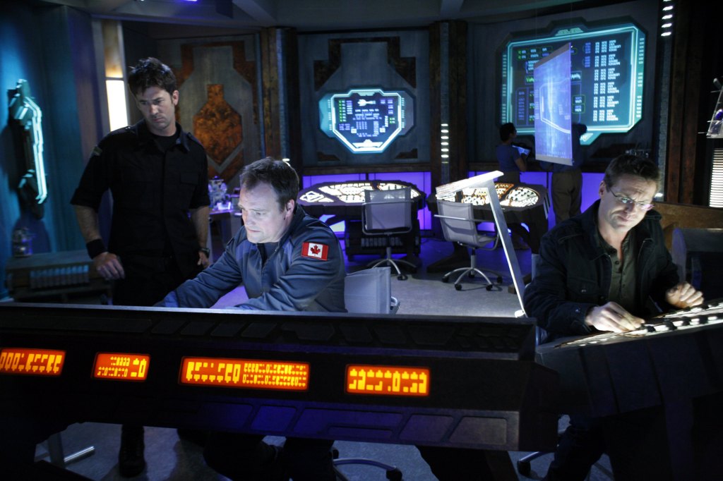STARGATE ATLANTIS, (from left), Joe Flanigan, David Hewlett, Michael Shanks, 'First Contact', (Season 5, ep. 510, airing Sept. 26, 2008), 2004-09. 