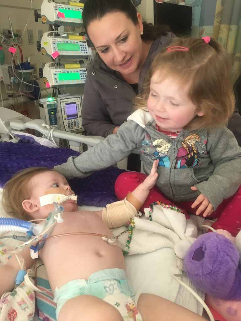 Amie and Ella in the hospital with Ava