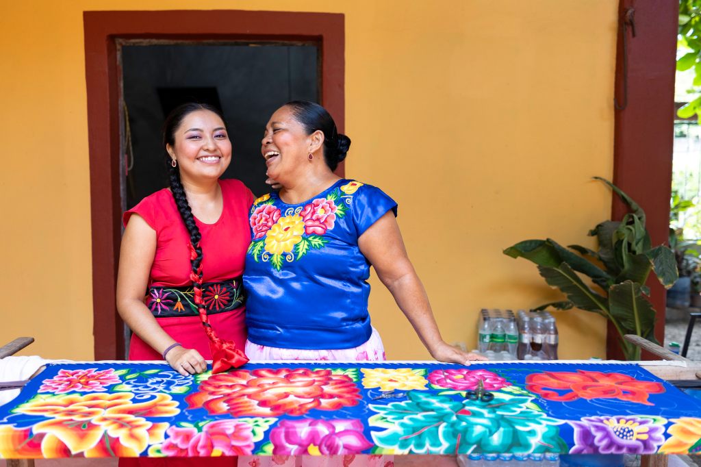 Loving family on balcony.