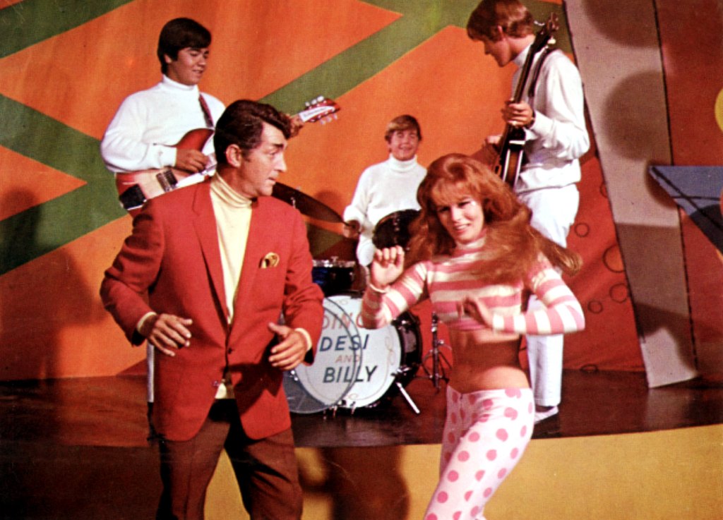 Dean Martin and Ann-Margret dance while Dino, Desi & Billy perform in Murderers' Row (1966)
