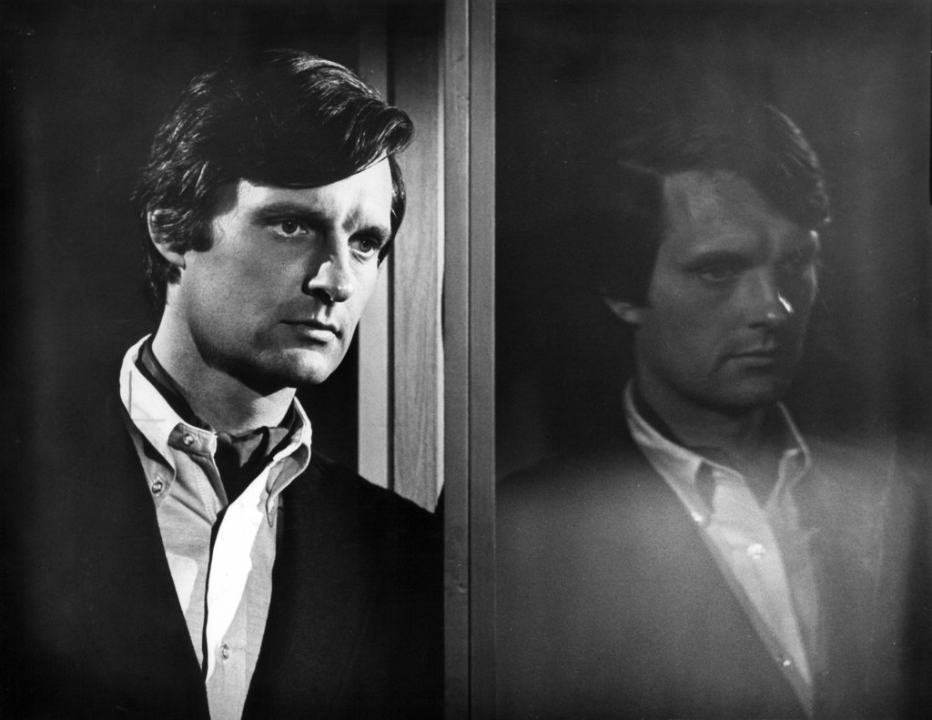 Alan Alda with his reflection in a scene from the film 'The Mephisto Waltz', 1971. 