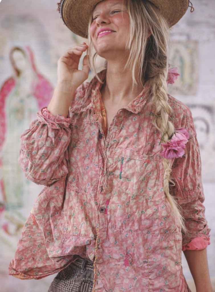 Magnolia Pearl garments showcasing layered textures, patchwork, and distressed fabrics, reflecting the brand’s focus on craftsmanship, storytelling, and resale value.