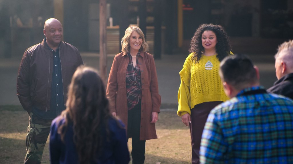 Melissa Cookston with chef Kevin Bludso and host Michelle Buteau on Netflix's American Barbecue Showdown in 2024