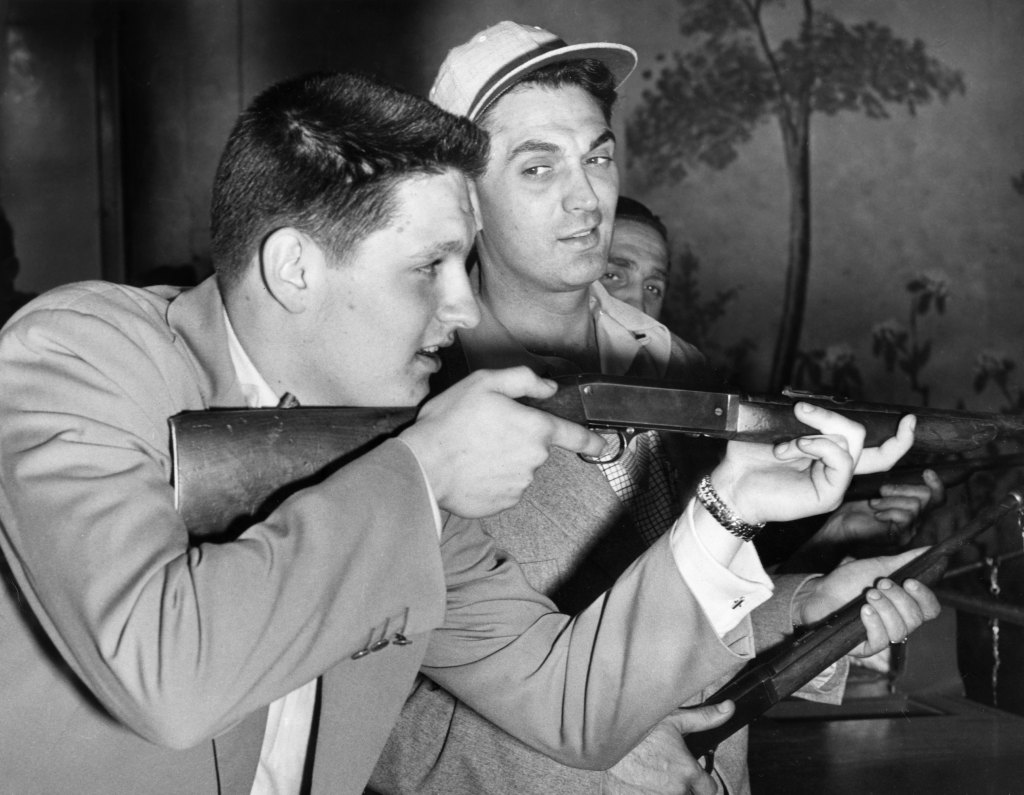 Robert Alda offers son Alan shooting tips, Palisades Park, NJ, 06-13-1951.