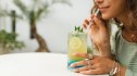 Close-up of woman enjoying an electrolyte drink for weight loss