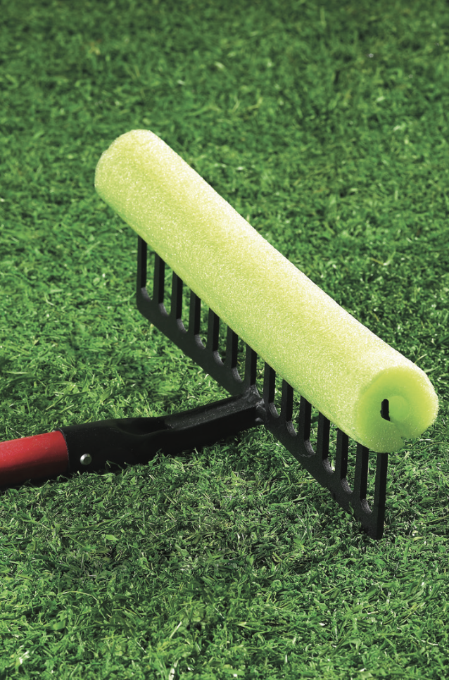 A rake with a pool noodle covering its sharp spikes