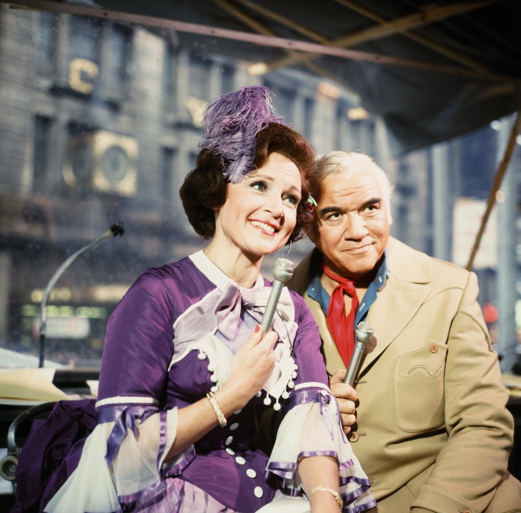 MACY'S THANKSGIVING DAY PARADE -- Pictured: (l-r) Hosts Betty White and Lorne Greene during the 1967 Macy's Thanksgiving Day Parade on November 23, 1967