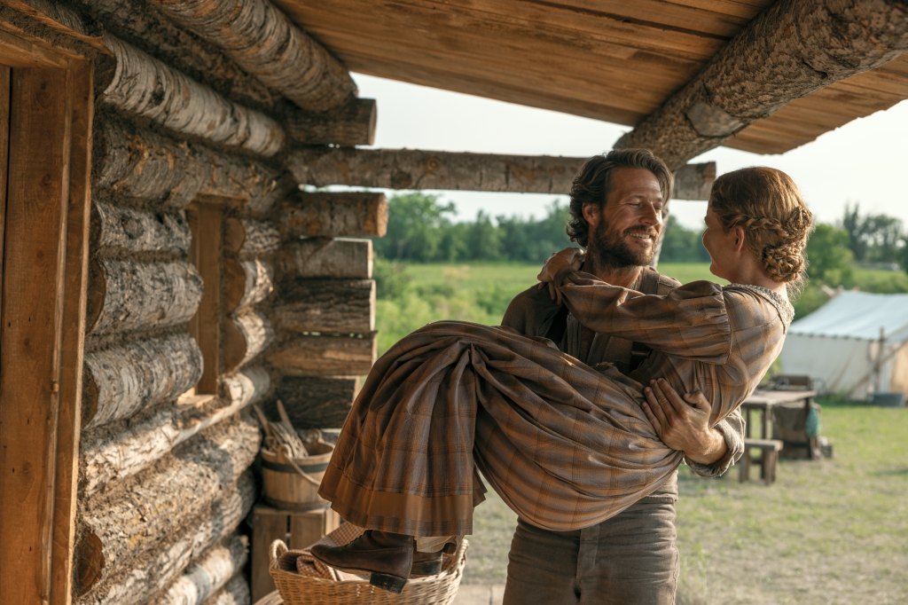 Luke Bracey as Charles Ingalls and Crosby Fitzgerald as Caroline Ingalls in 'Little House on the Prairie'