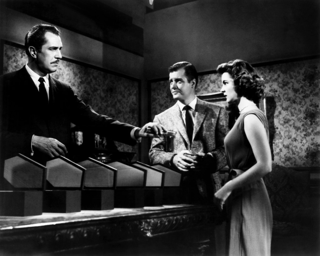 HOUSE ON HAUNTED HILL, from left, Vincent Price, Richard Long, Carolyn Craig, 1959