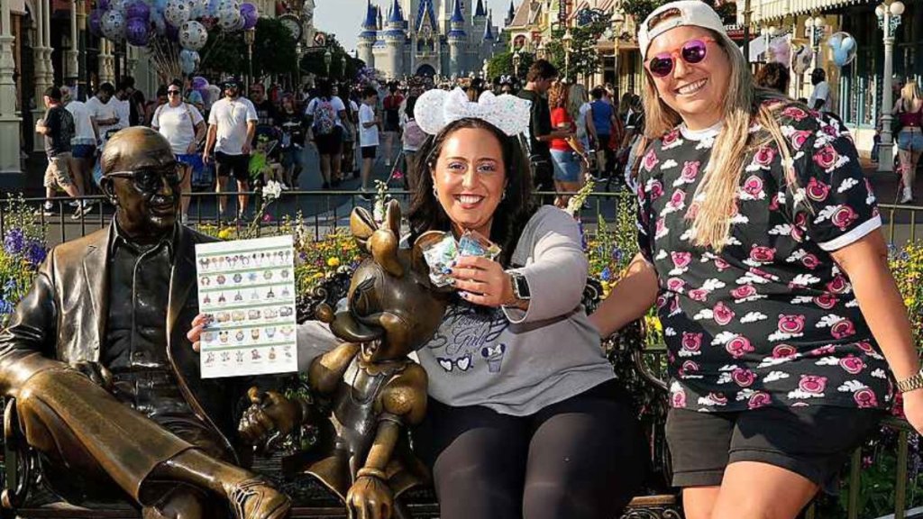 Myriam Estrella and her friend in Disney World collecting Hidden Mickey Wave A pins
