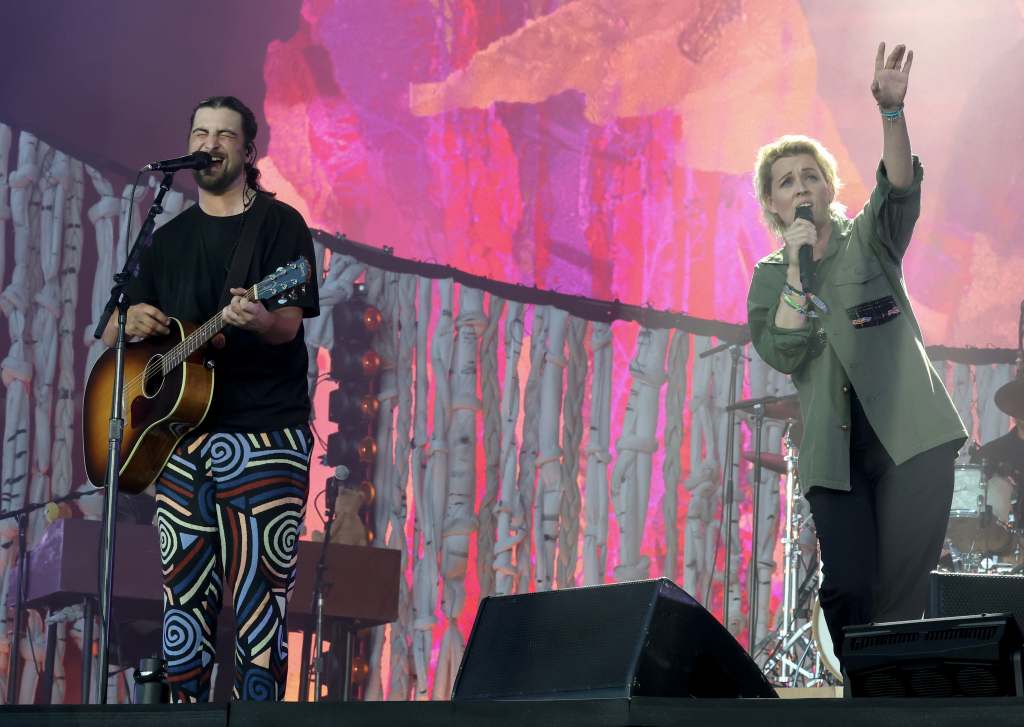 Noah Kahan performs with Brandi Carlile at the Glastonbury Festival in 2025.