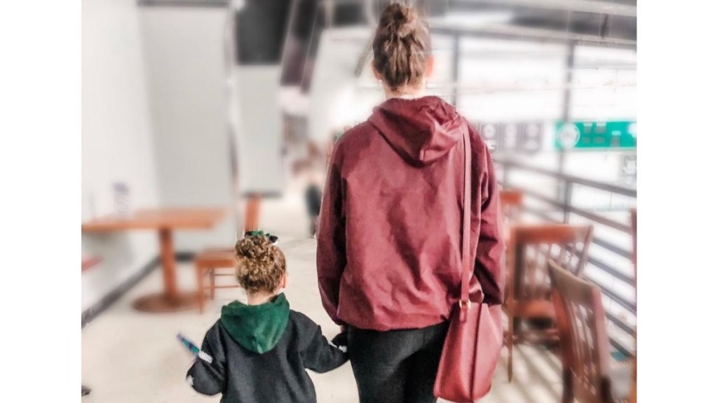 Rebecca Yarros with one of her daughters
