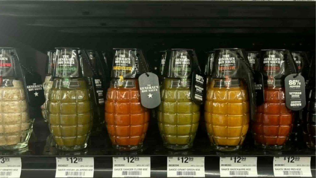 A shelf of colorful spices at Ace Hardware.